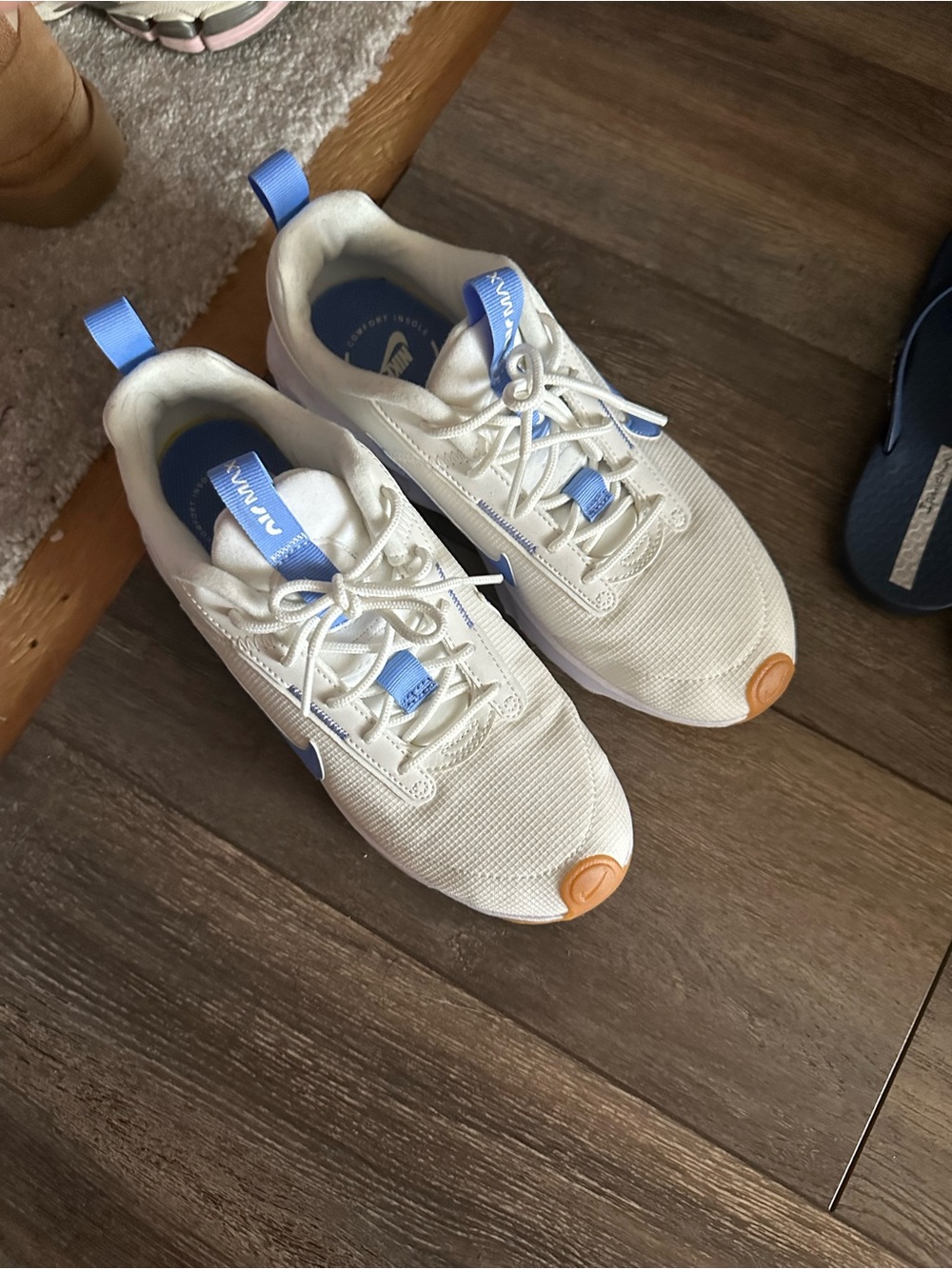 Nike White Sneakers with Light Blue Accents and Tan Toe